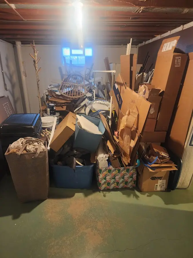 Roll-off dumpster container at job site for Yard Waste Dumpster Rental in Waverly